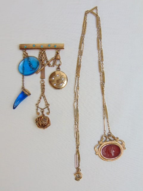 Jewelry. Antique gold filled chatelaine style brooch, pin w/ blue glass intaglio, horn, locket, (1 of 5)