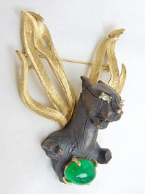 Jewelry. Vintage Trifari Diane Love design brooch Griffin w/ wings, faux emerald stone, mystical