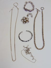 Sterling lot of Jewelry to include amethyst bracelet; cz 925 sgd. black enamel bangle, Beau sterling