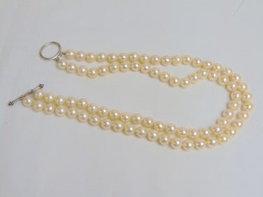 Jewelry. Double strand pearl necklace, each pearl approx. 8mm each sterling toggle clasp