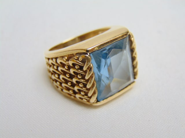 Jewelry. 14kt yellow gold men's ring w/ blue gemstone, 13 grams, size 6 1/4, textured design on (1 of 4)
