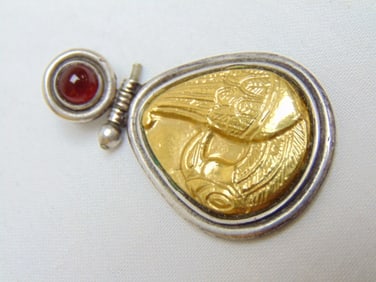 Jewelry. 24kt yellow gold & 925 pendant w/ cabochon carnelian, 10 grams, 1 3/4" length, good
