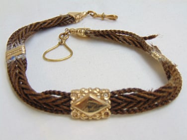 Jewelry. Victorian hair necklace tested 10kt gold, one broken strand, total weight 14 grams