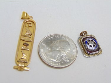 Jewelry. 2 pc 18kt to include 18kt tested Egyptian cartouche pendant, 3.50 grams & 18k enamel white