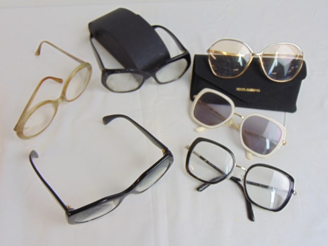 6 pairs Designer Couture Glasses, Prada, Dolce Gabbana & round vintage pair: 6 pairs Vintage eyewear, glasses to include 4 Prada 1 Dolce & Gabbana & 1 pair round vintage glasses. all pairs are prescription glasses, good used condition.