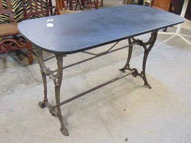 French steel base slate top table, art nouveau style design on base, top is 52" by 25", height is 28