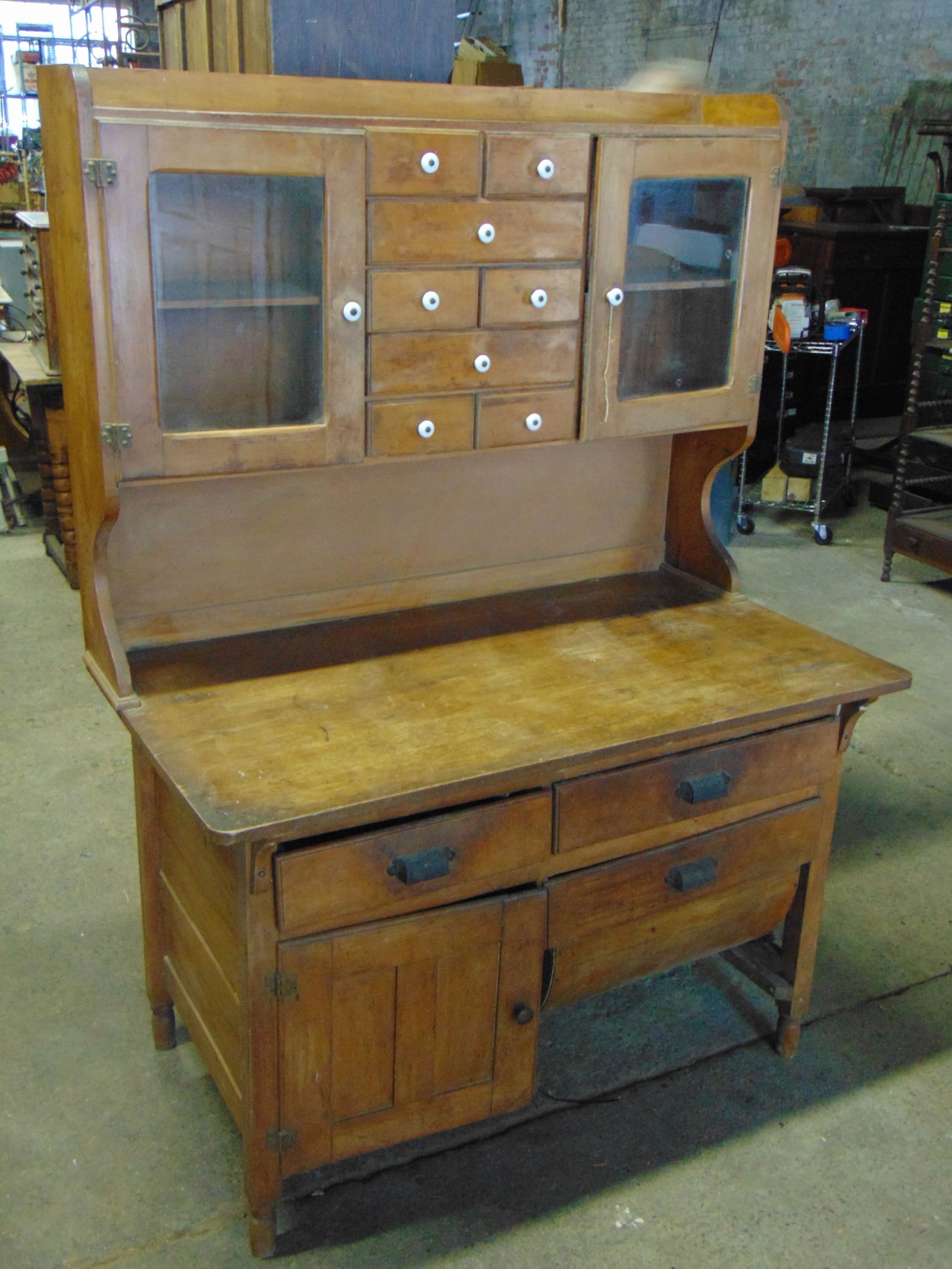 Maple Hoosier cabinet, multi drawer top with cabinet sides,46" wide, 26" deep, height is: Maple Hoosier cabinet, multi drawer top with cabinet sides, Hoosier is 46" wide, 26" deep, height is 63.75"