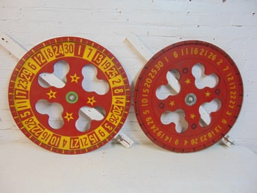 2 wheels of fortune, in red & yellow, diameter of wheels is 30"