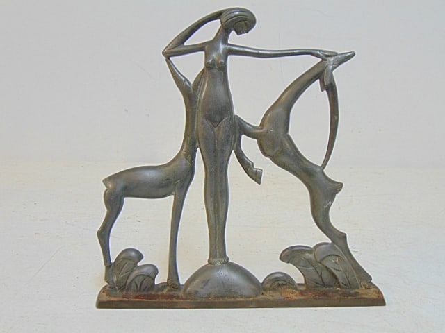 Art deco lead sculpture, woman with deer, on bronze base, height is 8.75", 8 5/8" wide, has small: Art deco lead sculpture, woman with deer, on bronze base, height is 8.75", 8 5/8" wide, has small break on leg