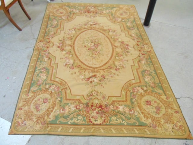 Needlepoint rug, floral decorated with center medallion, good condition, carpet is 8'4" by 5'9": Needlepoint rug, floral decorated with center medallion, good condition, carpet is 8'4" by 5'9"