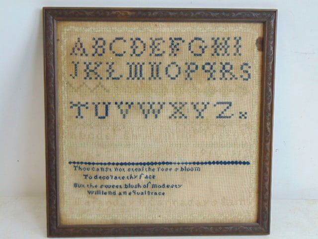 Small framed sampler, "Thou Canst Not Steal the Roses Bloom to Decorate Thy Face"12.5" by 12.5": Small framed sampler, "Thou Canst Not Steal the Roses Bloom to Decorate Thy Face"12.5" by 12.5" framed size.