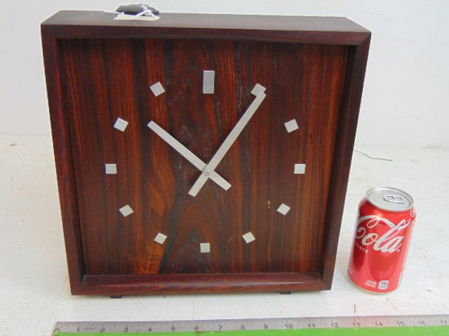 Mid Century rosewood clock, aluminum hands, clock is 12.5" tall, 12" wide, 3.5" deep.: Mid Century rosewood clock, aluminum hands, clock is 12.5" tall, 12" wide, 3.5" deep.