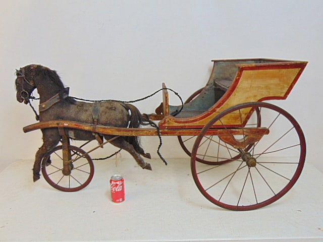 Children's horse drawn carriage toy, 48" long, 25.5" tall, depth is 18.5", paint decorated carriage.: Children's horse drawn carriage toy, 48" long, 25.5" tall, depth is 18.5", paint decorated carriage.