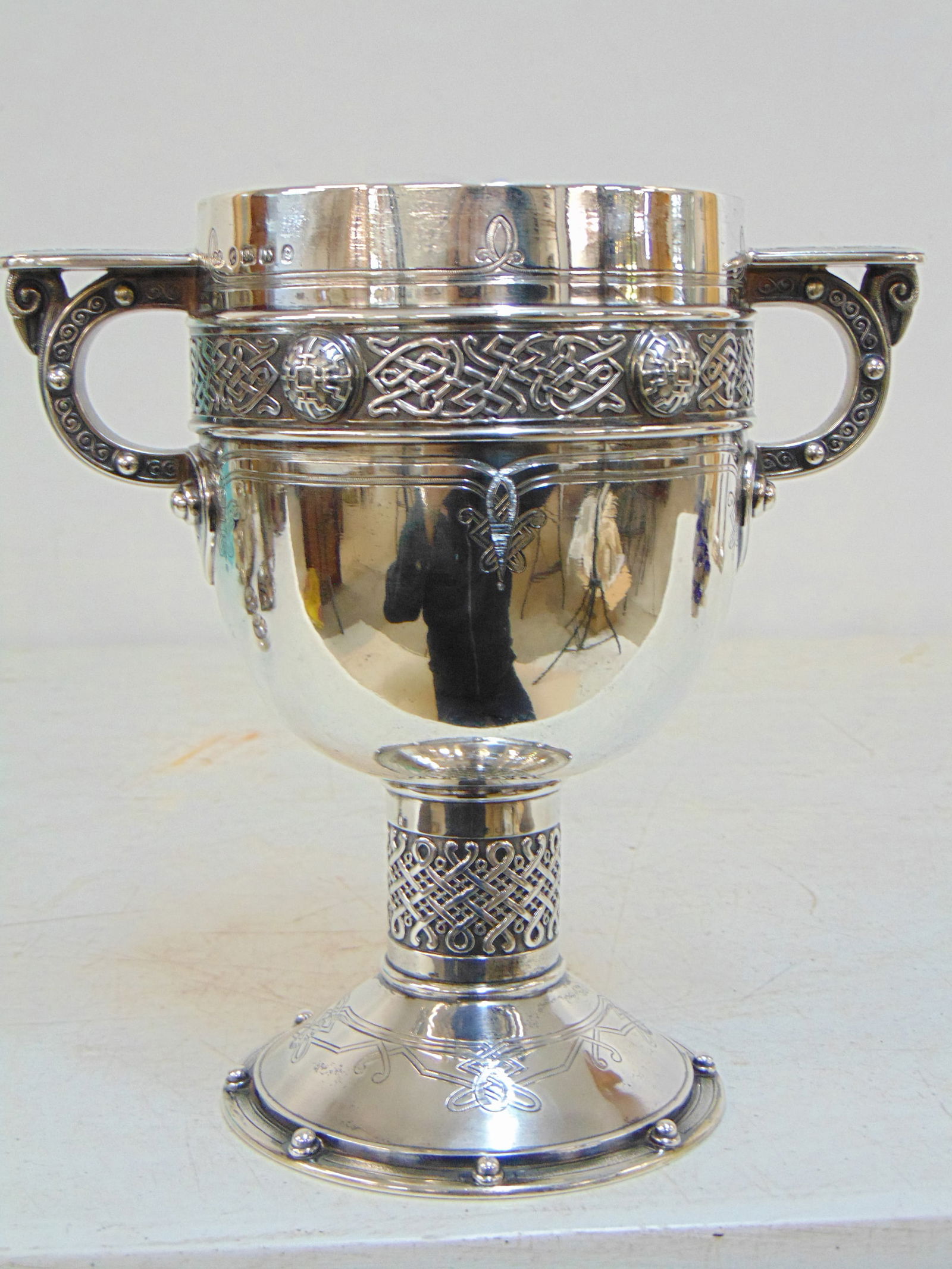 Sterling silver Celtic Revival Chalice probably designed by Christopher Dresser for Elkington & Co,: Sterling silver Celtic Revival Chalice probably designed by Christopher Dresser for Elkington & Co, 28 troy, height is 8", diameter top is 4.75"