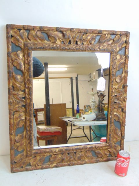 Carved framed mirror, gilt & paint decorated, 27.75" by 24.25": Carved framed mirror, gilt & paint decorated, 27.75" by 24.25"