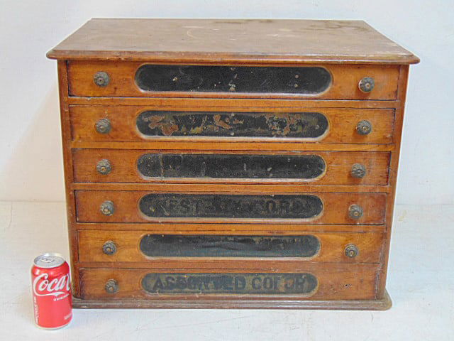 Spool cabinet, "J&P Coats Thread", 6 drawers, original decals on reverse, one drawer is missing: Spool cabinet, "J&P Coats Thread", 6 drawers, original decals on reverse, one drawer is missing knob, cabinet is 24.5" by 16.5", height is 19"