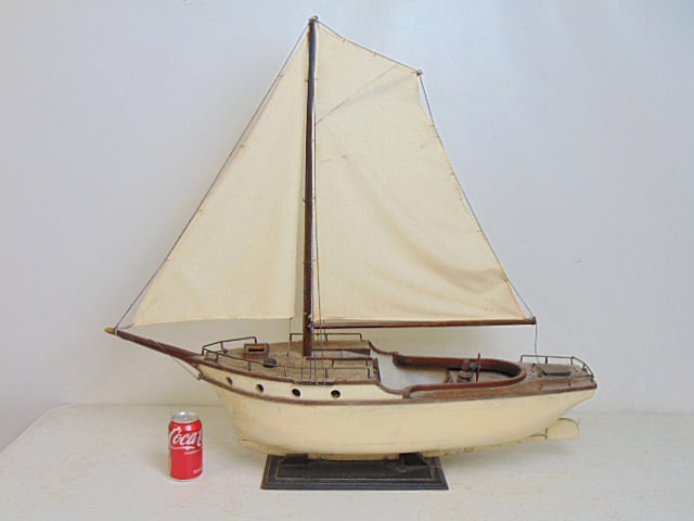 Early primitive sailboat model, hull is 38" long, height is 35".: Early primitive sailboat model, hull is 38" long, height is 35".