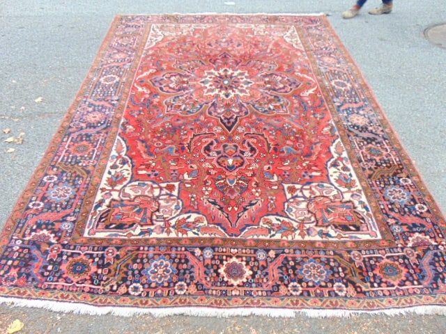 Room Size Persian carpet, in red with center medallion, rug is 8'8" by 12'1": Room Size Persian carpet, in red with center medallion, rug is 8'8" by 12'1"