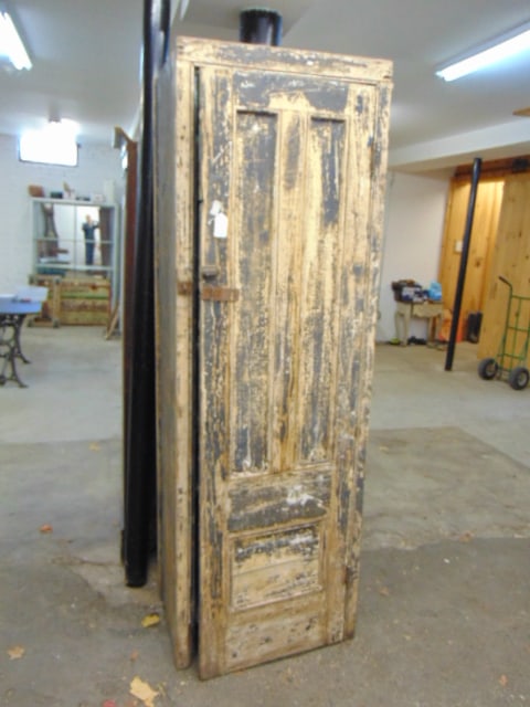 Country cupboard, single door, in old distressed paint, shelved interior, cabinet is 27.5" by 19.5",: Country cupboard, single door, in old distressed paint, shelved interior, cabinet is 27.5" by 19.5", height is 82.75"