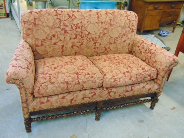 Upholstered loveseat with carved base, spiral stretcher, clean, loveseat is 61" long, 29" deep,: Upholstered loveseat with carved base, spiral stretcher, clean, loveseat is 61" long, 29" deep, height is 37"