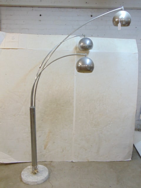 Chrome floor lamp on marble base with three arms, spotlight, chrome is pitted, some loss, height is: Chrome floor lamp on marble base with three arms, spotlight, chrome is pitted, some loss, height is as shown is 76"