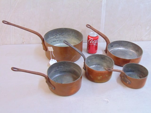 Set 5 copper pots with wrought iron handles, largest pot is 8.75" in diameter, heavy duty quality.: Set 5 copper pots with wrought iron handles, largest pot is 8.75" in diameter, heavy duty quality.