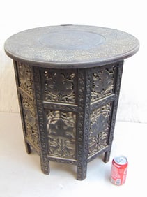 Moroccan carved side table with carved top, intricately carved grape leaf pattern octagonal folding