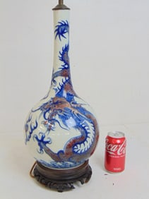 Chinese porcelain lamp decorated with dragon, wood base, base is as is, no signature, height as
