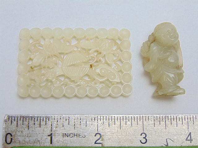 2 carved Chinese Jade pieces, floral carved piece & small carved figure: 2 carved Chinese Jade pieces, floral carved piece & small carved figure, floral piece is 2.5" by 1.5", small figure is 1.75"