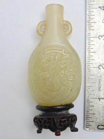 Small carved Jade vase on wood base, base attached, carved detail, 4" tall