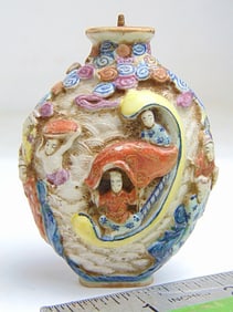 Chinese porcelain snuff bottle decorated with figures surrounding a boat, signed, has spoon, cover