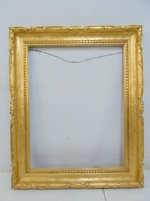 Large gilt frame, opening is 36 3/8" by 28.5", outer dimensions are 45.75" by 37 7/8", in good