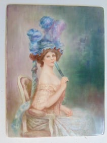 Limoges porcelain plaque, elegant woman with feather headdress seated in armchair, plaque is 11.25"
