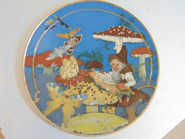 German Mettlach charger by Heinrich Schlitt, gnome reading on mushrooms with various butterflies, in