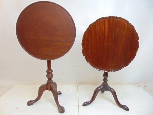 Two mahogany tilt top stands, one dish top with scalloped top & carved base, one plain with bird: Two mahogany tilt top stands, one dish top with scalloped top & carved base, one plain with bird cage base, has cracked leg