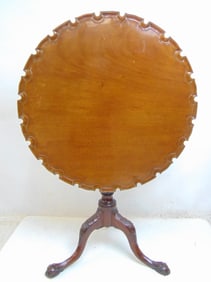 Antique tilt top pedestal table with pie crust edge top, ball & claw feet, 28.5" tall, diameter is