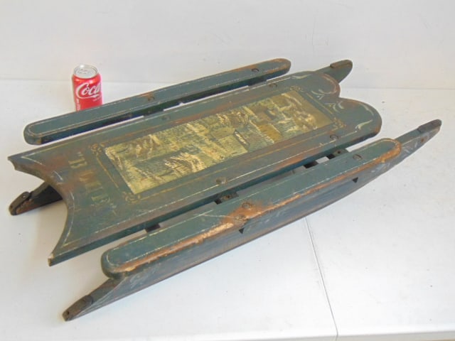 Paint decorated 19th Century sled, stamped on bottom, "Property of Wayside Inn, dated on side, 1876,: Paint decorated 19th Century sled, stamped on bottom, "Property of Wayside Inn, dated on side, 1876, with landscape painted on seating area with the word "Blue" stenciled underneath, one iron glider i
