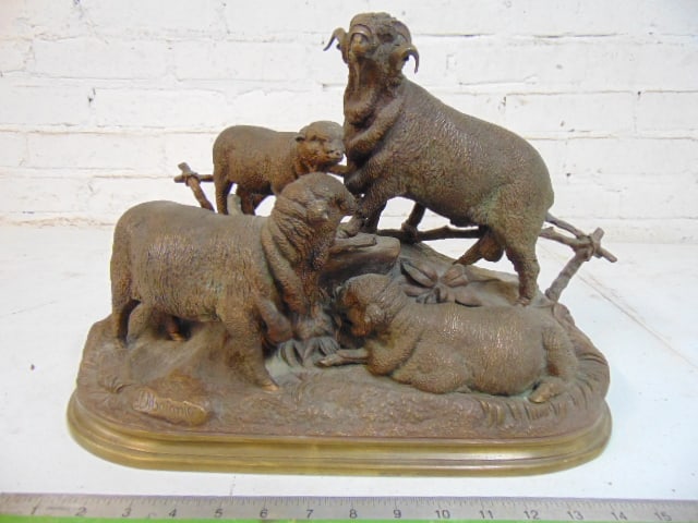 Bronze group of rams , signed J. Moigniez, 4 rams by fence, bronze is 16.75" long, 7.75" deep,: Bronze group of rams , signed J. Moigniez, 4 rams by fence, bronze is 16.75" long, 7.75" deep, height is 11"