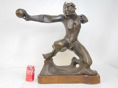 Bronze sculpture, abstract faced figure with ball, signed Nicoli (Claudio), on wood base, bronze is