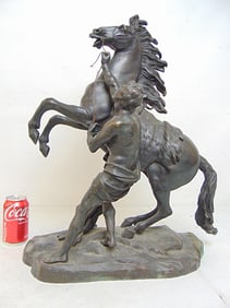 Bronze figural, "The Horse Tamer", signed Coustou (Guillaume), base is 19" by 8", height is 23", has