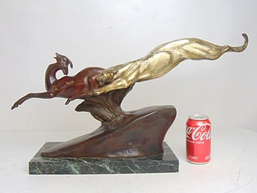 Art deco bronze, puma or lion jumping an antelope, signed Francisque, Medaille d'Or, on marble base,