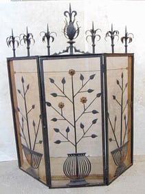 Wrought iron copper mesh fire screen with decorative floral planters applied to screen, screen is