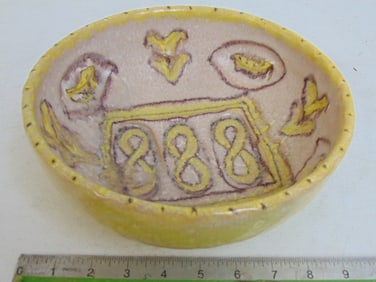 Italian pottery bowl, Gambone, decorated interior, yellow exterior, 9.5" in diameter, height is