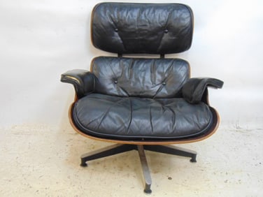 Early Charles Eames chair, needs repair, back is loose, no ottoman, black leather`