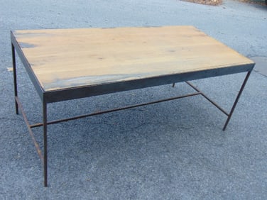 Steel base oak top table, stretcher base, table is 69" by 33", height is 29.25".