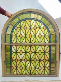 Leaded glass window, domed top, diamond pattern, window is 43.35" by 37.25", several small panels