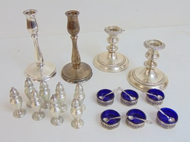 Weighted sterling lot, 2 pair candle , holders 8 small salt & pepper shakers, 6 salts with cobalt