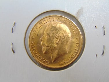 GOLD COIN 1914 British Sovereign coin 8 grams.