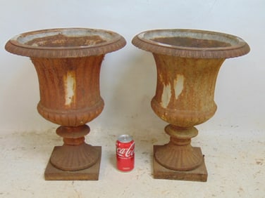 Pair cast iron garden urns, urns are 14.5" wide, height is 18.75"