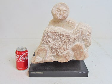 Carved stone Inuit carving, "Young Shepherd", Adele Elow, pink stone on wood base, 8" by 12" base,